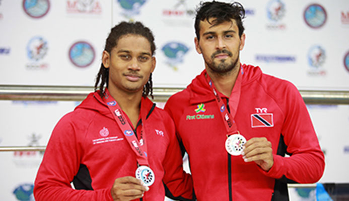 Christian Awah and Dylan Carter lef to right display their medals, rduring the XXX CCCAN Swimming Championships 2017, at the National Aquatic Centre, Couva. Carter sent a new CCCAN record in 52.73. Christian Awah and Dylan Carter lef to right display their medals, rduring the XXX CCCAN Swimming Championships 2017, at the National Aquatic Centre, Couva. Carter sent a new CCCAN record in 52.73.