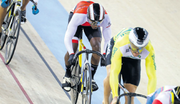 Kwesi Browne(TTO) during the first round of the Men’s Keirin. He placed third and didn’t automatically advance, but got into the semifinals with a win in the Repechage on day 2 of the Elite Pan American Track Championships at the National Cycling Centre, Couva, yesterday. PHOTO: RICHARD LYDER/ CA IMAGES Kwesi Browne(TTO) during the first round of the Men’s Keirin. He placed third and didn’t automatically advance, but got into the semifinals with a win in the Repechage on day 2 of the Elite Pan American Track Championships at the National Cycling Centre, Couva, yesterday. PHOTO: RICHARD LYDER/ CA IMAGES