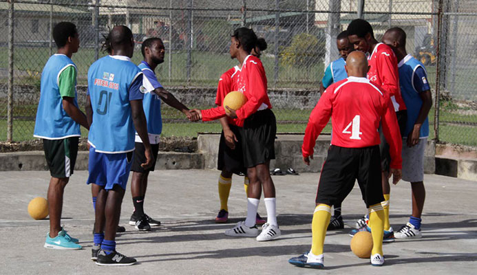 Futsal friendly: Maximum Security Prison (MSP) and Remand Yard inmates exchange greetings before a game of futsal at MSP in Arouca. PHOTOS BY ROGER JACOB Futsal friendly: Maximum Security Prison (MSP) and Remand Yard inmates exchange greetings before a game of futsal at MSP in Arouca. PHOTOS BY ROGER JACOB