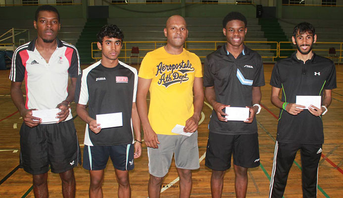 Aaron Wilson,left and Yuvraaj Dooram, right, will be representing TT, along with veteran Dexter St Louis and Rheann Chung at the upcoming Commonwealth Games to be held between April 4-15 in Birmingham,England. Aaron Wilson,left and Yuvraaj Dooram, right, will be representing TT, along with veteran Dexter St Louis and Rheann Chung at the upcoming Commonwealth Games to be held between April 4-15 in Birmingham,England.