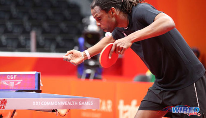 Photo: Dexter St Louis serves during a table tennis contest with Northern Ireland at the Gold Coast 2018 Commonwealth Games on 6 April. (Copyright Allan V Crane/CA-Images/Wired868) Photo: Dexter St Louis serves during a table tennis contest with Northern Ireland at the Gold Coast 2018 Commonwealth Games on 6 April. (Copyright Allan V Crane/CA-Images/Wired868)