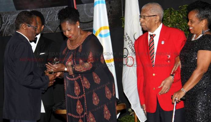 Veteran journalist Dave Lamy (left) receives the Alexander Chapman Award from President Paula-Mae Weekes, at the TTOC Awards, Hyatt, Port of Spain on December 29 2018. Behind them is TTOC president Brian Lewis. Also in photo is Alexander Chapman (second from right) and TTOC Secretary General, Annette Knott. PHOTO BY ANGELO MARCELLE. - Angelo Marcelle Veteran journalist Dave Lamy (left) receives the Alexander Chapman Award from President Paula-Mae Weekes, at the TTOC Awards, Hyatt, Port of Spain on December 29 2018. Behind them is TTOC president Brian Lewis. Also in photo is Alexander Chapman (second from right) and TTOC Secretary General, Annette Knott. PHOTO BY ANGELO MARCELLE. - Angelo Marcelle