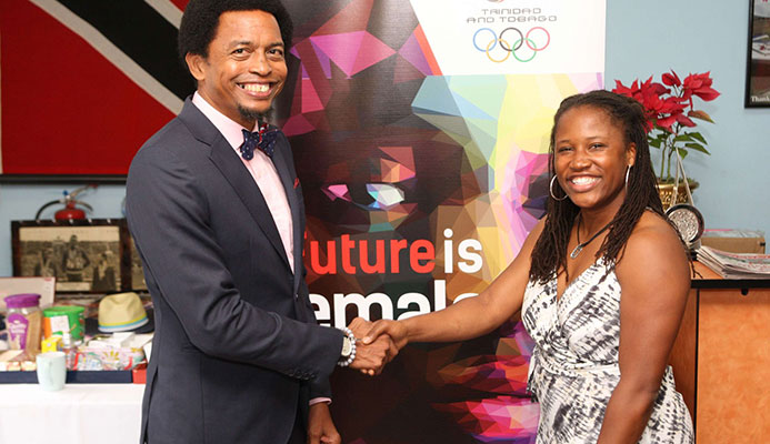American Lauryn Williams, a four-time Olympian, with T&T Olympic Committee president Brian Lewis at Olympic House on Abercromby Street, Port-of-Spain, yesterday ahead of the three-time Olympic medallist’s discussion on her athletic career and life thereafter. American Lauryn Williams, a four-time Olympian, with T&T Olympic Committee president Brian Lewis at Olympic House on Abercromby Street, Port-of-Spain, yesterday ahead of the three-time Olympic medallist’s discussion on her athletic career and life thereafter.