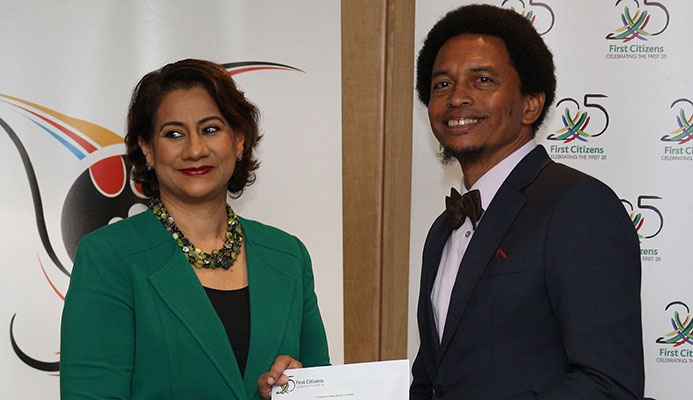 Karen Darbasie, Group Chief Executive Officer First Citizens presents a cheque for an undisclosed sum to T&TOC president, Brian Lewis at First Citizens Corporate Centre, Queen’s Park East, Port of Spain, yesterday . Karen Darbasie, Group Chief Executive Officer First Citizens presents a cheque for an undisclosed sum to T&TOC president, Brian Lewis at First Citizens Corporate Centre, Queen’s Park East, Port of Spain, yesterday .