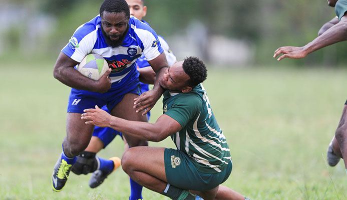 Northerns' Mark Roberts pommels Harvards' Kyle Strachan during the Solomoon Hochoy Ruggerama Tournament at the Queen's Park Savannah. Northerns won 5-0 in sudden death.  Allan V. Crane Northerns' Mark Roberts pommels Harvards' Kyle Strachan during the Solomoon Hochoy Ruggerama Tournament at the Queen's Park Savannah. Northerns won 5-0 in sudden death.  Allan V. Crane