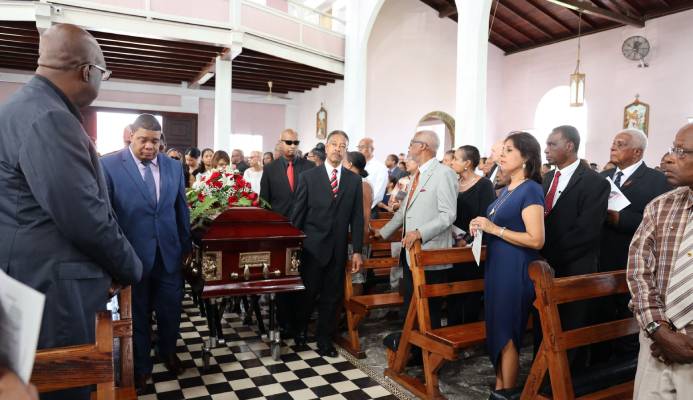 Gerard Tim Kee, left, was among the pallbearers who carried his father's casket into the church during his funeral service at St Theresa’s Roman Catholic Church yesterday. Gerard Tim Kee, left, was among the pallbearers who carried his father's casket into the church during his funeral service at St Theresa’s Roman Catholic Church yesterday.