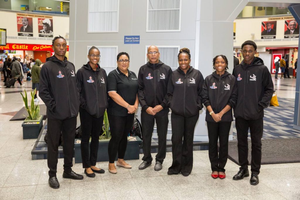 Athletes and officials of the NGC NAAA youth elite programme at the Piarco International Airport last year before the team left to attend the Michael Johnson Performance Unit in Texas for advanced athlete assessments and training. -  Athletes and officials of the NGC NAAA youth elite programme at the Piarco International Airport last year before the team left to attend the Michael Johnson Performance Unit in Texas for advanced athlete assessments and training. -