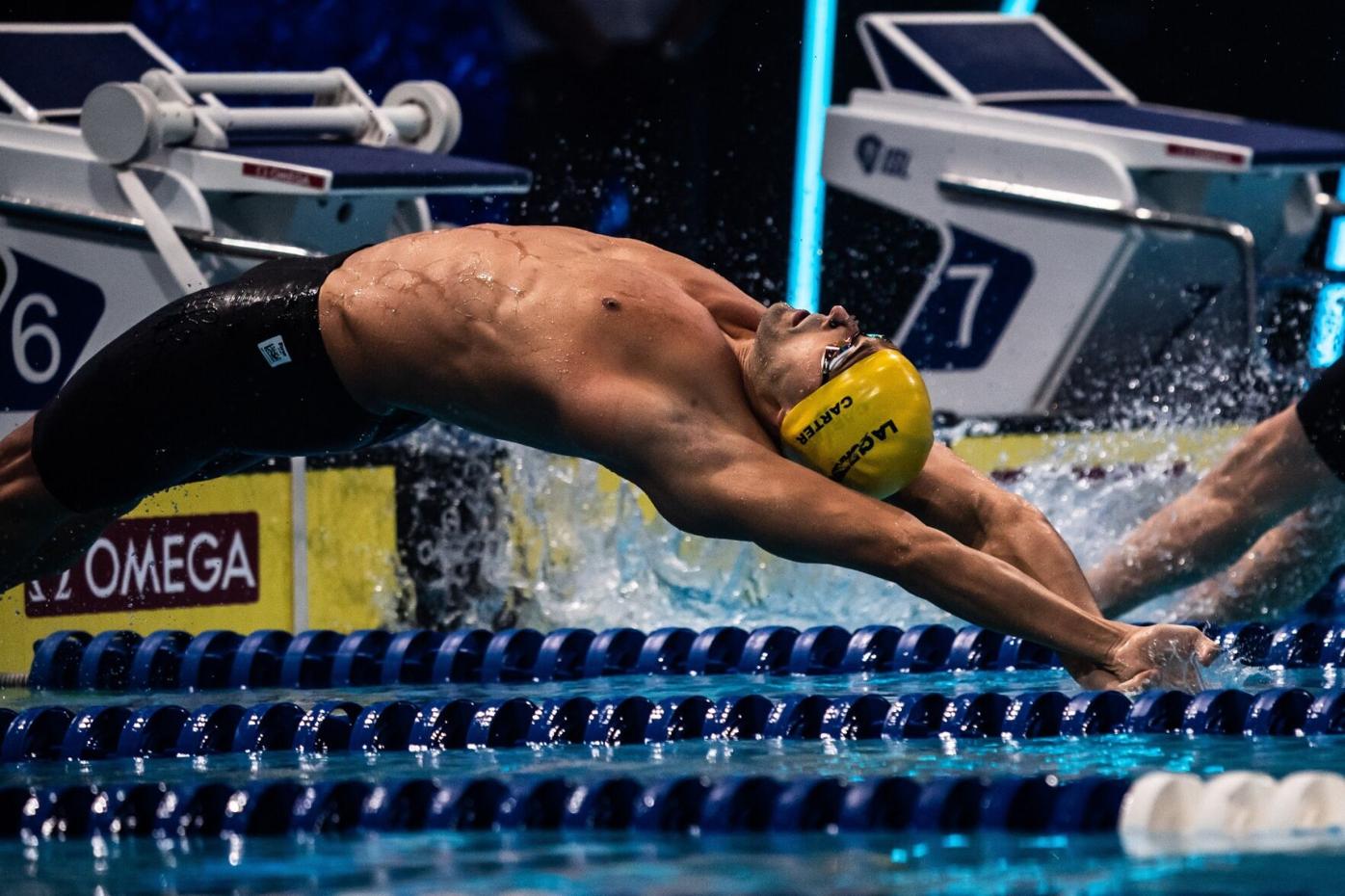 (flashback) FULL STRETCH: Los Angeles Current’s Dylan Carter gets off to a quick start in the Men’s 100m backstroke, during match number 10 of the International Swimming League (ISL) 2020, at the Duna Arena in Budapest, Hungary, yesterday. Carter bagged silver in the event, in a new national record time of 50.11 seconds. --Photo courtesy ISL (flashback) FULL STRETCH: Los Angeles Current’s Dylan Carter gets off to a quick start in the Men’s 100m backstroke, during match number 10 of the International Swimming League (ISL) 2020, at the Duna Arena in Budapest, Hungary, yesterday. Carter bagged silver in the event, in a new national record time of 50.11 seconds. --Photo courtesy ISL