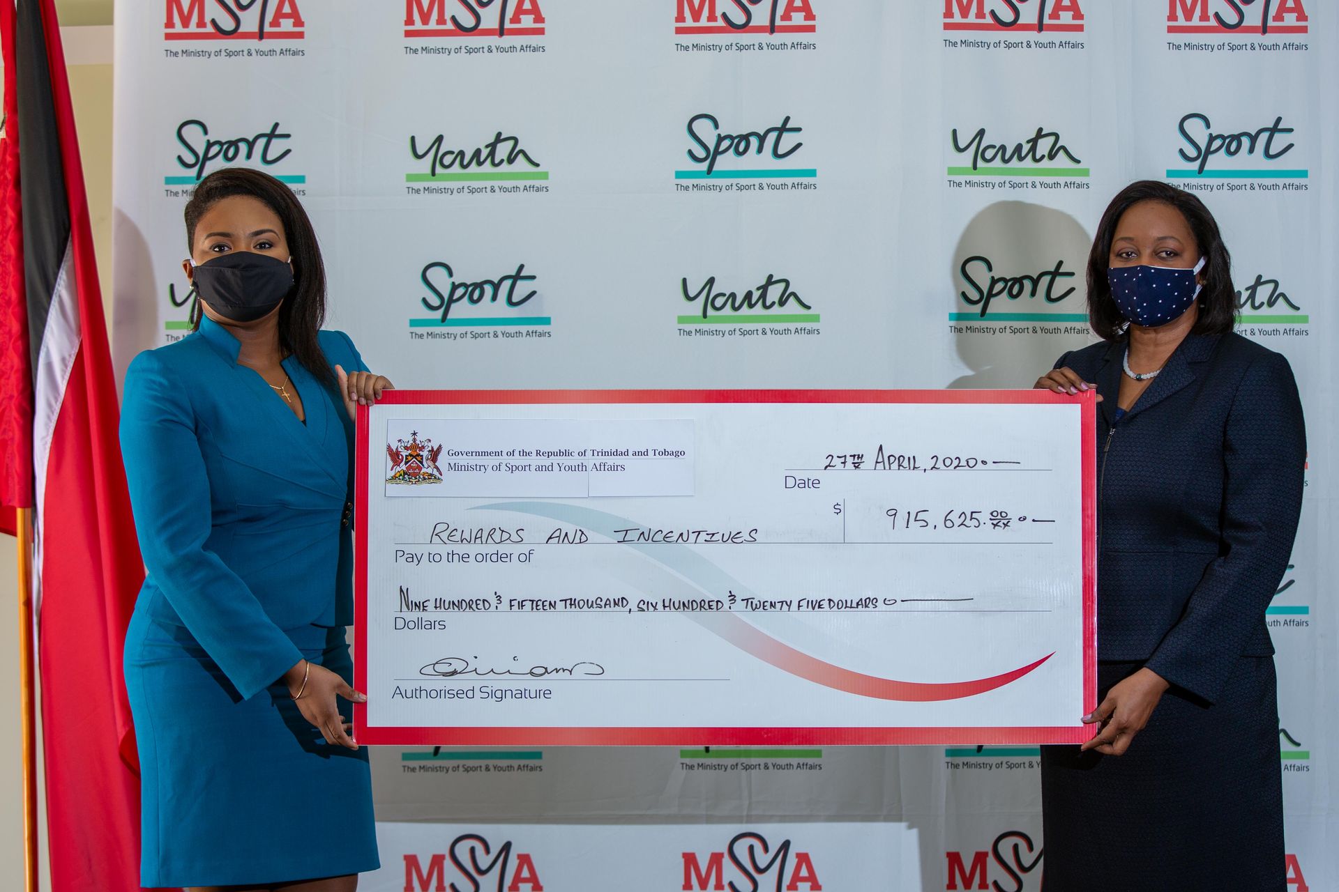 Sports and Youth Affairs Minister Shamfa Cudjoe and Permanent Secretary Claire Davidson-Williams sports the cheque for the Rewards and Incentives Programme. Cheques for different sums were distributed to several T&T athletes on Wednesday.  Kerron Savory Sports and Youth Affairs Minister Shamfa Cudjoe and Permanent Secretary Claire Davidson-Williams sports the cheque for the Rewards and Incentives Programme. Cheques for different sums were distributed to several T&T athletes on Wednesday.  Kerron Savory