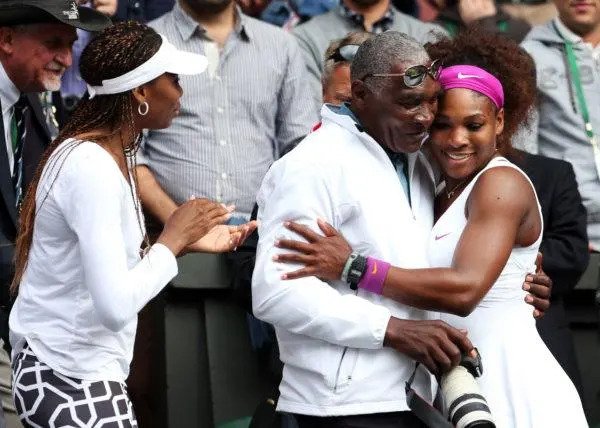 Serena Williams (R) of the USA celebrates with her father Richard Williams and sister Venus Williams after her Ladies’ Singles final match against Agnieszka Radwanska of Poland on day twelve of the Wimbledon Lawn Tennis Championships at the All England Lawn Tennis and Croquet Club on July 7, 2012 in London, England. (Photo by Julian Finney/Getty Images) Serena Williams (R) of the USA celebrates with her father Richard Williams and sister Venus Williams after her Ladies’ Singles final match against Agnieszka Radwanska of Poland on day twelve of the Wimbledon Lawn Tennis Championships at the All England Lawn Tennis and Croquet Club on July 7, 2012 in London, England. (Photo by Julian Finney/Getty Images)