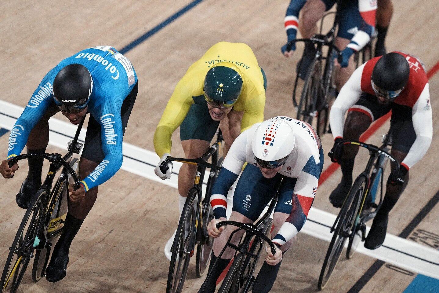 SPRINT ON: Colombia’s Kevin Santiago Quintero, left to right, Australian Matthew Glaetzer, Britain’s Jack Carlin and T&T’s Kwesi Browne compete in a semi-final heat of the Men’s Keirin race, at the 2020 Summer Olympics, in Izu, Japan, yesterday. —Photo: AP SPRINT ON: Colombia’s Kevin Santiago Quintero, left to right, Australian Matthew Glaetzer, Britain’s Jack Carlin and T&T’s Kwesi Browne compete in a semi-final heat of the Men’s Keirin race, at the 2020 Summer Olympics, in Izu, Japan, yesterday. —Photo: AP