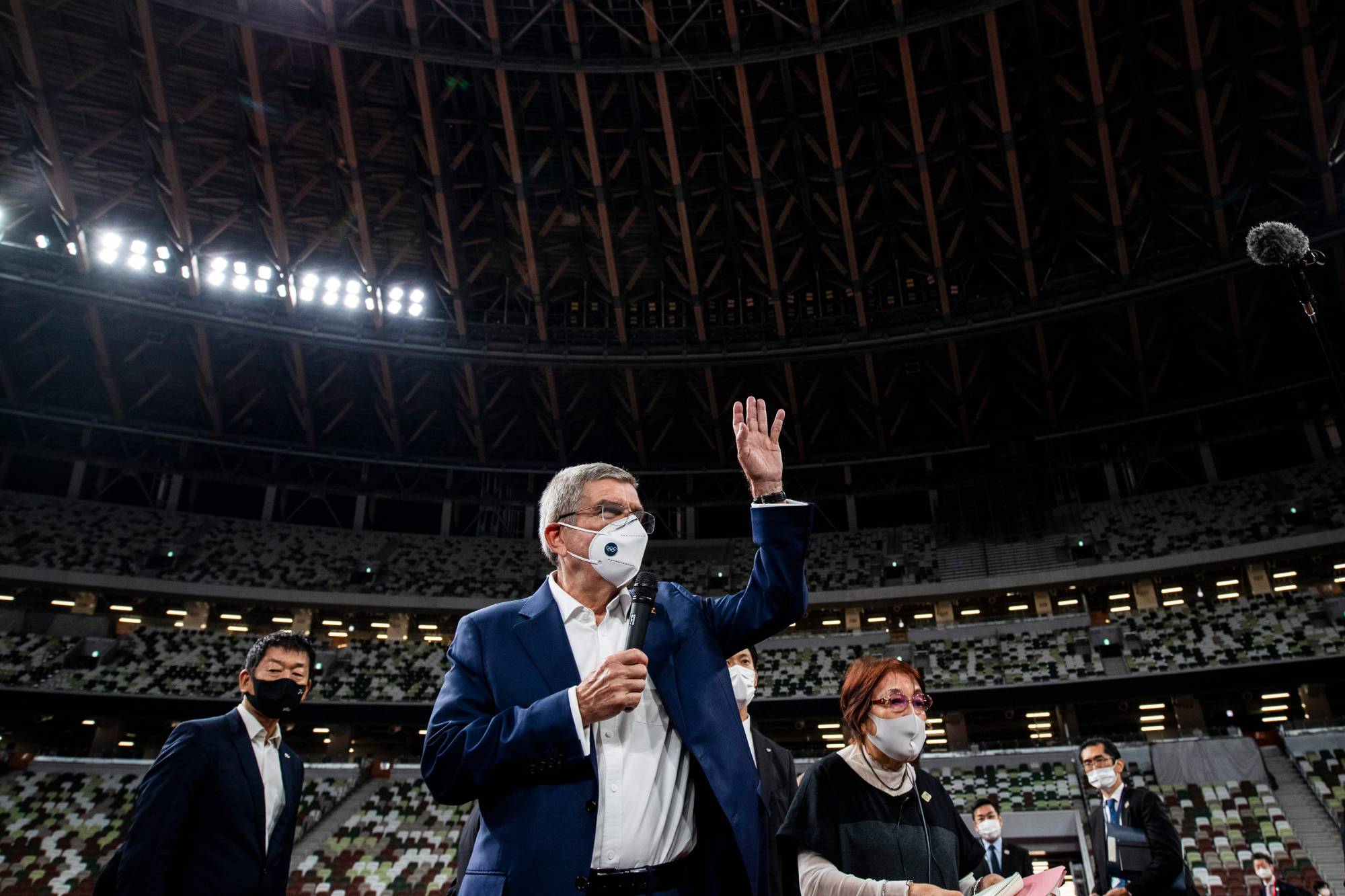 Thomas Bach speaks to the media during a visit to Tokyo's National Stadium on Nov. 17, 2020. | AFP-JIJI Thomas Bach speaks to the media during a visit to Tokyo's National Stadium on Nov. 17, 2020. | AFP-JIJI