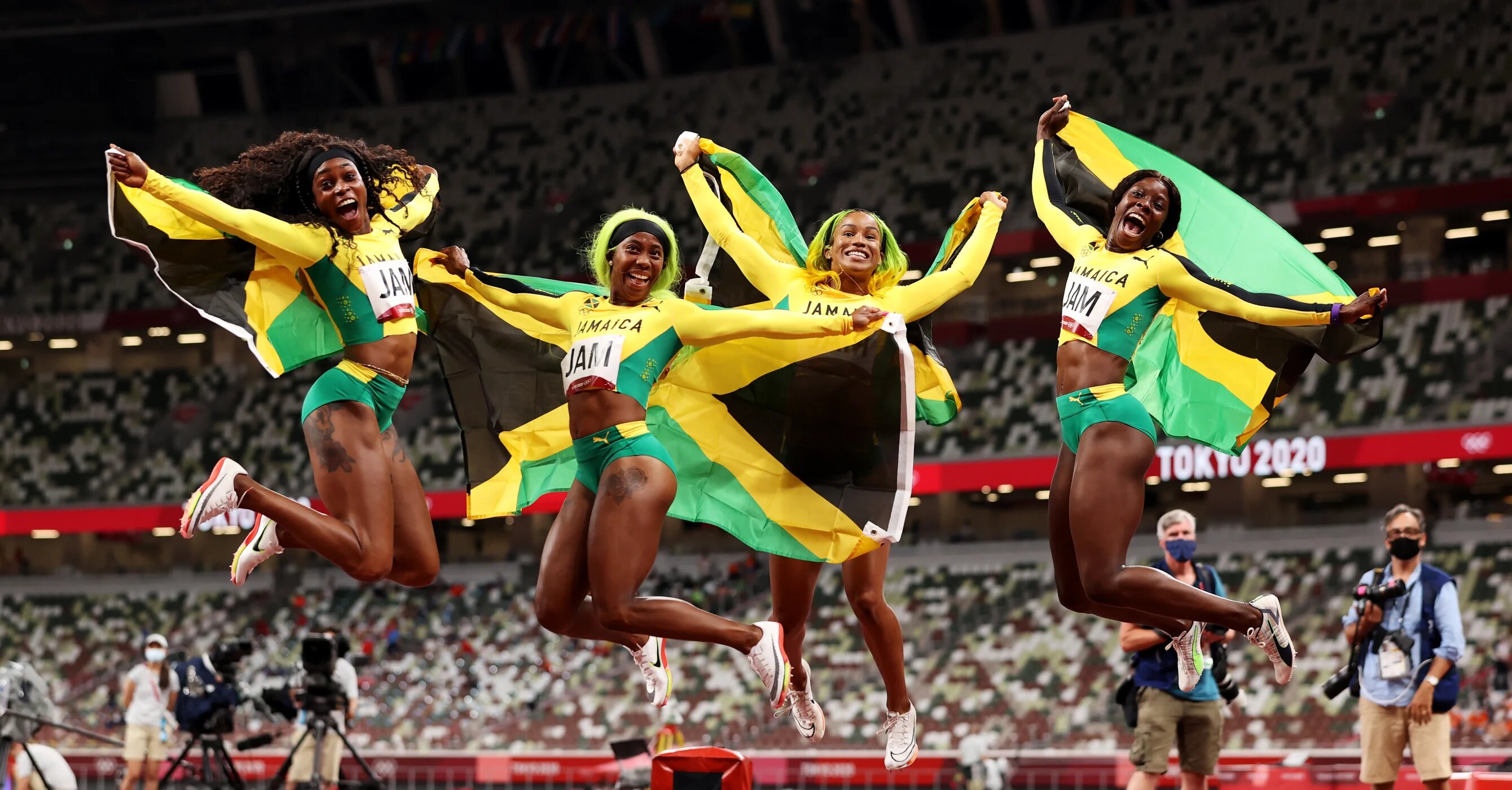 Briana Williams, Elaine Thompson-Herah, Shelly-Ann Fraser-Pryce and Shericka Jackson of Team Jamaica celebrate winning the gold medal in the Women's 4 x 100m Relay Final on day fourteen of the Tokyo 2020 Olympic Games at Olympic Stadium on August 06, 2021 in Tokyo, Japan. (Photo by David Ramos/Getty Images) 2021 Getty Images Briana Williams, Elaine Thompson-Herah, Shelly-Ann Fraser-Pryce and Shericka Jackson of Team Jamaica celebrate winning the gold medal in the Women's 4 x 100m Relay Final on day fourteen of the Tokyo 2020 Olympic Games at Olympic Stadium on August 06, 2021 in Tokyo, Japan. (Photo by David Ramos/Getty Images) 2021 Getty Images