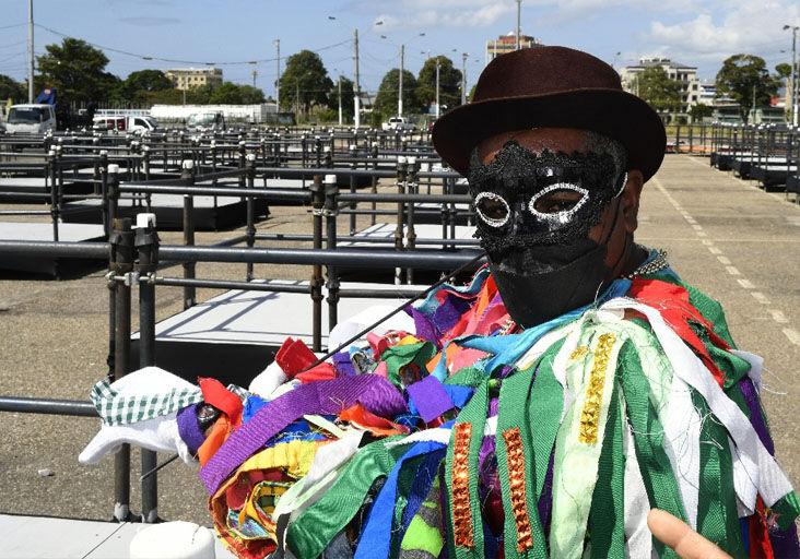 touring the pods: Pierrot grenade Dale Delecia views one of the Carnival pods located at Carnival City, Queen’s Park Savannah, Port of Spain, during a tour by NCC chairman Winston “Gypsy” Peters and Commissioner Darian Marcelle  on Monday.  —Photo: JERMAINE CRUICKSHANK touring the pods: Pierrot grenade Dale Delecia views one of the Carnival pods located at Carnival City, Queen’s Park Savannah, Port of Spain, during a tour by NCC chairman Winston “Gypsy” Peters and Commissioner Darian Marcelle  on Monday.  —Photo: JERMAINE CRUICKSHANK