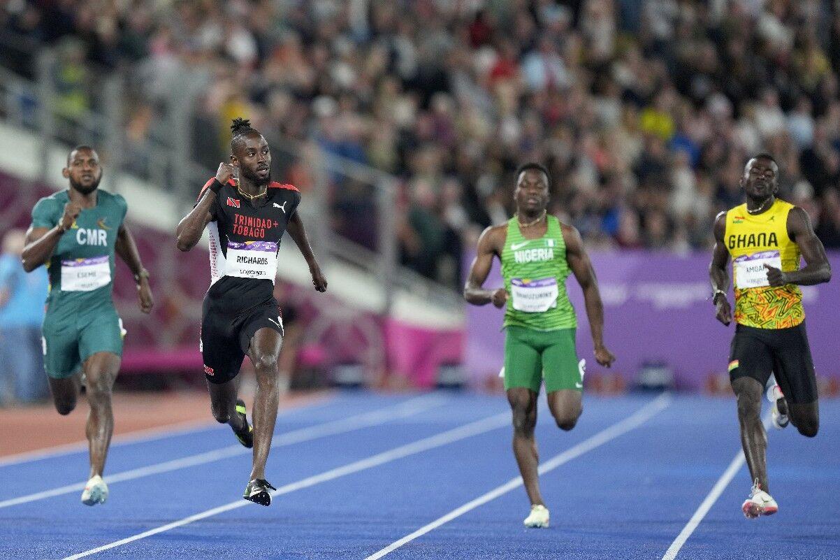 MAKING DREAMS COME TRUE: Jereem Richards of Trinidad and Tobago, second left, looks across the track as he leaves Emmanuel Eseme of Cameroon, left, Udodi Chudi Onwuzurike of Nigeria, second right, and Paul Amoah of Ghana in his wake in the Commonwealth Games Men’s 200 metres final at the Alexander Stadium in Birmingham, England, yesterday. —Photo: AP (via: trinidadexpress.com) MAKING DREAMS COME TRUE: Jereem Richards of Trinidad and Tobago, second left, looks across the track as he leaves Emmanuel Eseme of Cameroon, left, Udodi Chudi Onwuzurike of Nigeria, second right, and Paul Amoah of Ghana in his wake in the Commonwealth Games Men’s 200 metres final at the Alexander Stadium in Birmingham, England, yesterday. —Photo: AP (via: trinidadexpress.com)