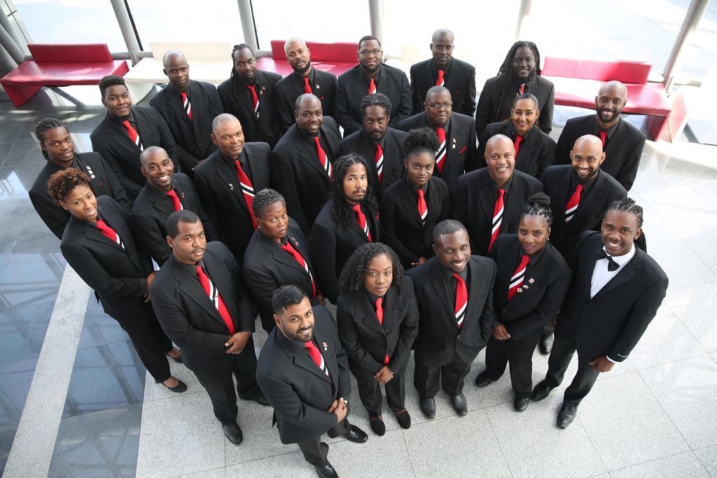 Members of the T&T National Steel Symphony Orchestra (NSSO) pose with their musical director, Akua Leith, front right. (Source: guardian.co.tt) Members of the T&T National Steel Symphony Orchestra (NSSO) pose with their musical director, Akua Leith, front right. (Source: guardian.co.tt)