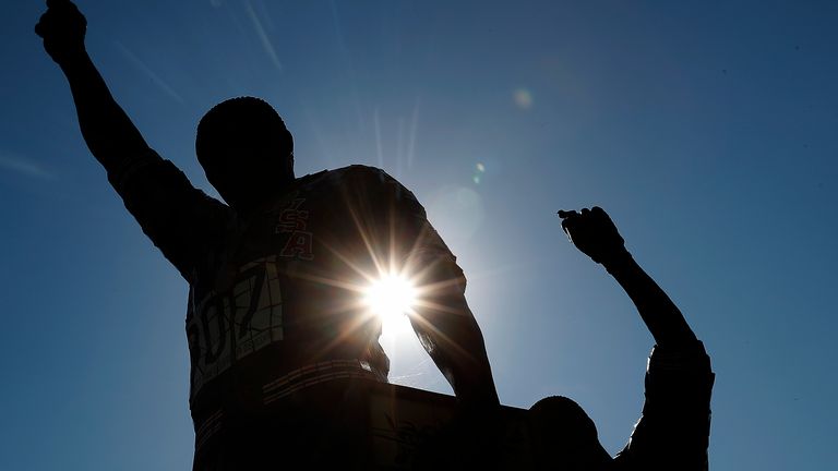 A statue in honour of Tommie Smith and John Carlos on the campus of San Jose State University A statue in honour of Tommie Smith and John Carlos on the campus of San Jose State University