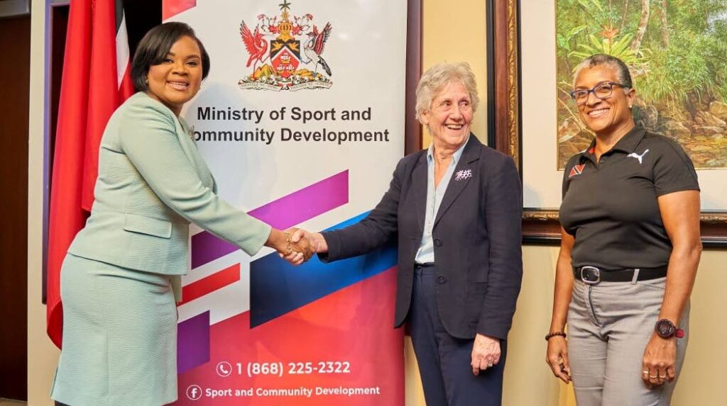 Minister of Sport and Community Development Shamfa Cudjoe, left, greets Commonwealth Youth Games president Dame Louise Martin as TTOC president Diane Henderson looks on during a meeting on Monday at the ministry, Port of Spain. Photo courtesy Ministry of Sport and Community Development (Image obtained at newsday.co.tt) Minister of Sport and Community Development Shamfa Cudjoe, left, greets Commonwealth Youth Games president Dame Louise Martin as TTOC president Diane Henderson looks on during a meeting on Monday at the ministry, Port of Spain. Photo courtesy Ministry of Sport and Community Development (Image obtained at newsday.co.tt)