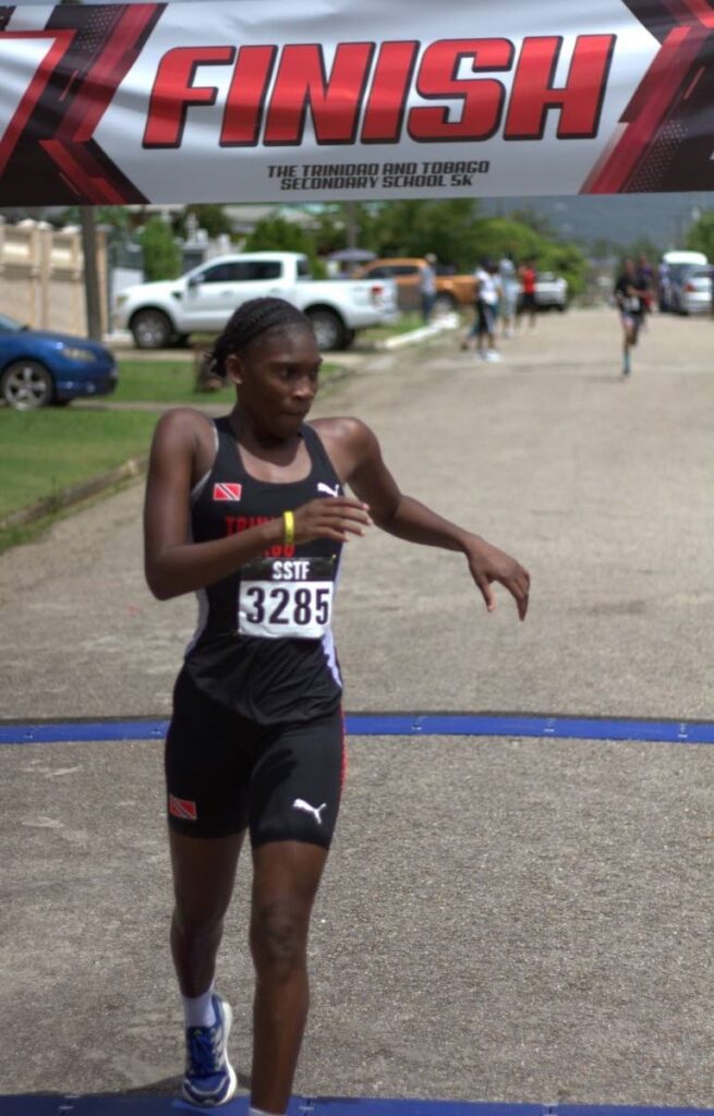 Successful Shian: Success Laventille Secondary School's Shian Lewis crosses the line in top spot in the girls' category at the Secondary Schools Track and Field North Region 5K in Malabar on October 10. - Photo courtesy Holy Cross College photography (Image obtained at newsday.co.tt) Successful Shian: Success Laventille Secondary School's Shian Lewis crosses the line in top spot in the girls' category at the Secondary Schools Track and Field North Region 5K in Malabar on October 10. - Photo courtesy Holy Cross College photography (Image obtained at newsday.co.tt)