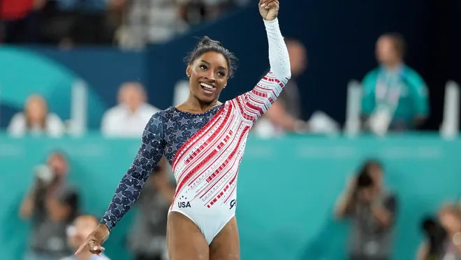 Simone Biles of the United States holds up the number one after the women’s team final at the Paris 2024 Olympic Summer Games at Bercy Arena on July 30, 2024. Kyle Terada, USA TODAY Sports (Image obtained at usatoday.com) Simone Biles of the United States holds up the number one after the women’s team final at the Paris 2024 Olympic Summer Games at Bercy Arena on July 30, 2024. Kyle Terada, USA TODAY Sports (Image obtained at usatoday.com)