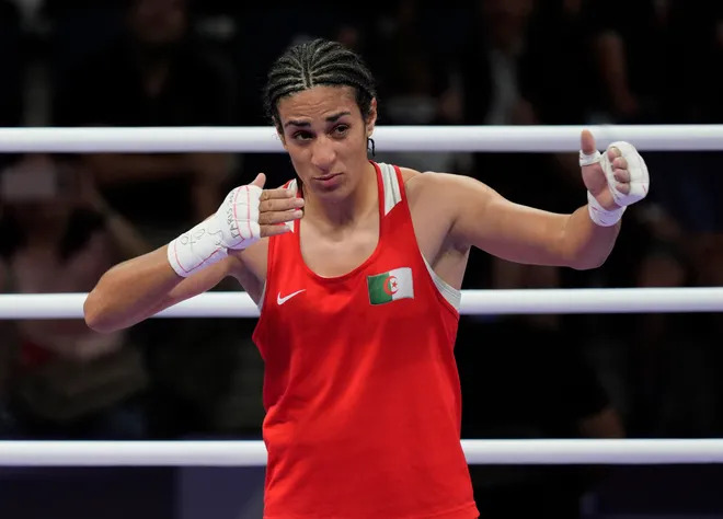 Aug 3, 2024; Paris, France; Image Khelif (ALG) reacts after defeating Anna Luca Hamori (HUN) in a women's 66kg boxing quarterfinal during the Parisa 2024 Olympic Summer Games at North Paris Arena. Mandatory Credit: Katie Goodale-USA TODAY Sports Katie Goodale, Katie Goodale-USA TODAY Sports (Image obtained at usatoday.com) Aug 3, 2024; Paris, France; Image Khelif (ALG) reacts after defeating Anna Luca Hamori (HUN) in a women's 66kg boxing quarterfinal during the Parisa 2024 Olympic Summer Games at North Paris Arena. Mandatory Credit: Katie Goodale-USA TODAY Sports Katie Goodale, Katie Goodale-USA TODAY Sports (Image obtained at usatoday.com)