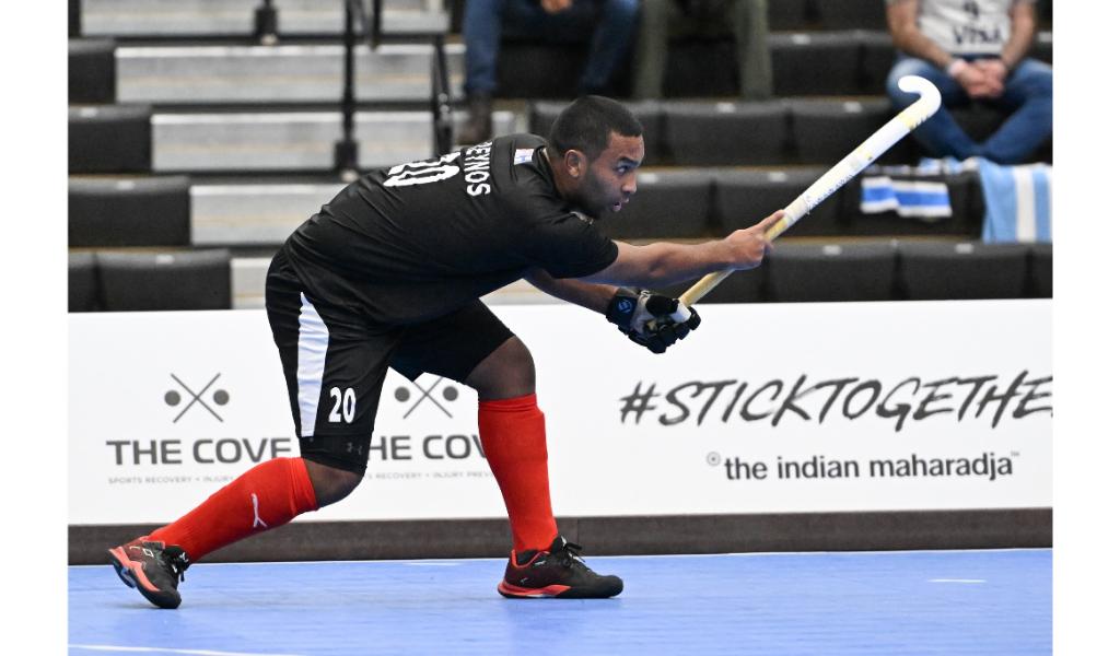 Trinidad and Tobago's Jordan Reynos fires a shot at goal during the Indoor Pan American Cup Men's final on Friday in Canada. Argentina beat T&T 5-2 in the final. (Photo credit - Pan American Hockey Federation) (Image obtained at tt.loopnews.com) Trinidad and Tobago's Jordan Reynos fires a shot at goal during the Indoor Pan American Cup Men's final on Friday in Canada. Argentina beat T&T 5-2 in the final. (Photo credit - Pan American Hockey Federation) (Image obtained at tt.loopnews.com)