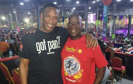 T&T football legend Shaka Hislop with Prime Minister Dr Keith Rowley at Panorama finals on Saturday night. (Photo credit - Pan Trinbago) (Image obtained at tt.loopnews.com) T&T football legend Shaka Hislop with Prime Minister Dr Keith Rowley at Panorama finals on Saturday night. (Photo credit - Pan Trinbago) (Image obtained at tt.loopnews.com)