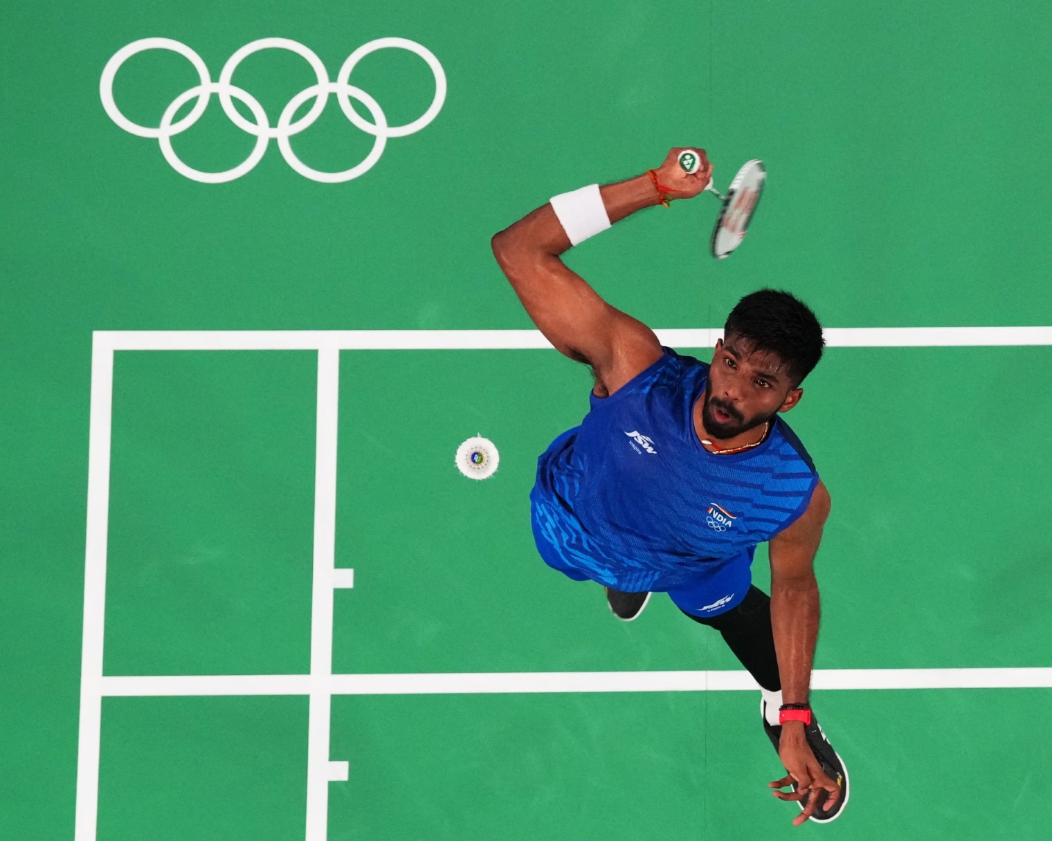 India’s Satwiksairaj Rankireddy in badminton action at the Paris 2024 Olympics. Photograph: Hamad I Mohammed/Reuters (Image obtained at theguardian.com)