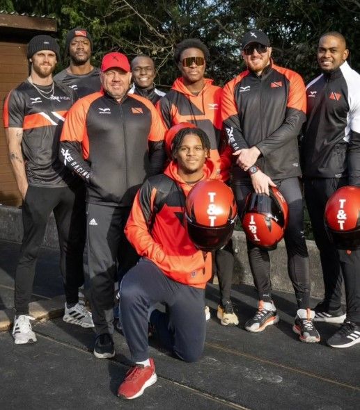 T&T bobsleigh team, from left, Jordan Raymond (coach), Nicholas King, Lee Johnson (head coach), Shakeel John, De Aundre John, Axel Brown, Xaverri Williams, and front (kneeling) Micah Moore. (Image obtained at guardian.co.tt) T&T bobsleigh team, from left, Jordan Raymond (coach), Nicholas King, Lee Johnson (head coach), Shakeel John, De Aundre John, Axel Brown, Xaverri Williams, and front (kneeling) Micah Moore. (Image obtained at guardian.co.tt)