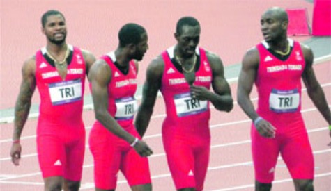 FINALISTS: Trinidad and Tobago 4x100-metre sprinters, from left, Keston Bledman, Richard Thompson, Marc Burns and Emmanuel Callender leave the track at the Olympic Stadium in London yesterday after competing in Heat 2. Team T&T qualified for today's relay final with a time of 38.10 seconds. The race will be run off at 4 p.m. (T&T time). —Photo: KWAME LAURENCE